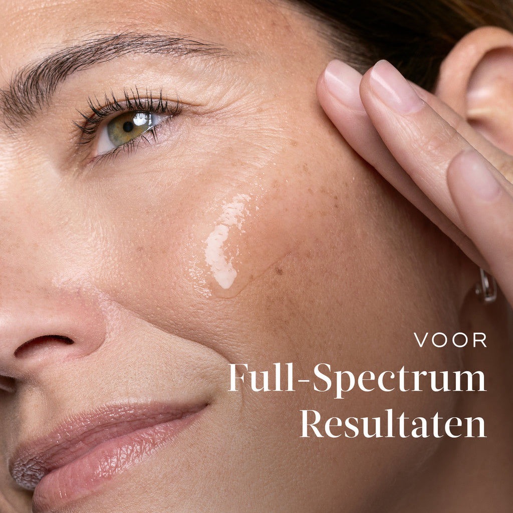 Close-up van een vrouw die Medik8-serum op haar wang aanbrengt, met tekst die verwijst naar full-spectrum resultaten.